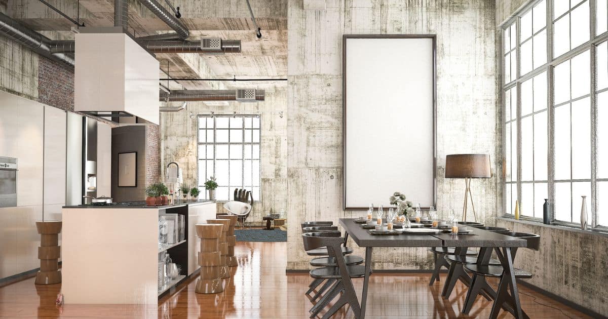 Cuisine industrielle avec sol en bois patiné et mur en béton