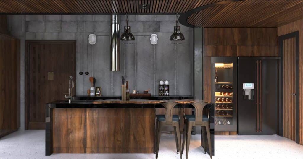 Cuisine noire et bois avec îlot central en marbre sombre, murs en béton brut et luminaires industriels.