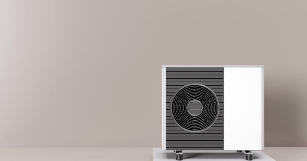 Une pompe à chaleur blanche et grise avec un fond d'une couleur taupe