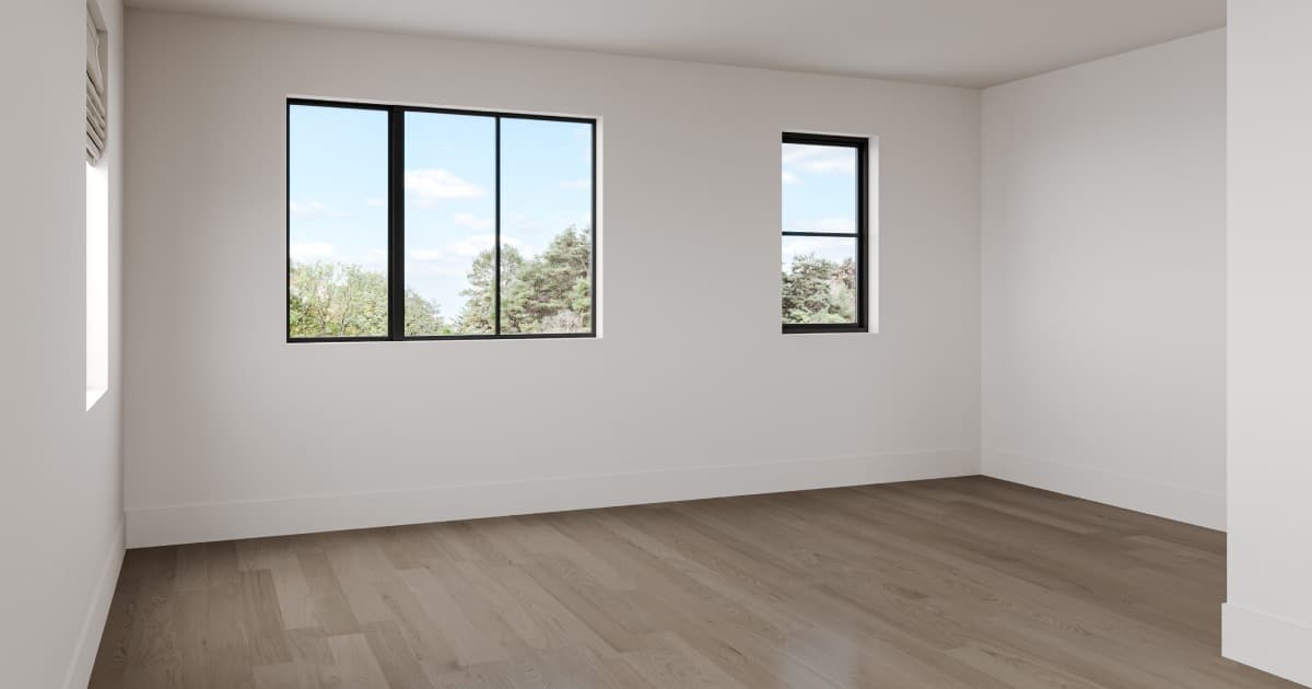 Nouvel appartement vide. Pièce aux murs blancs et châssis noirs.