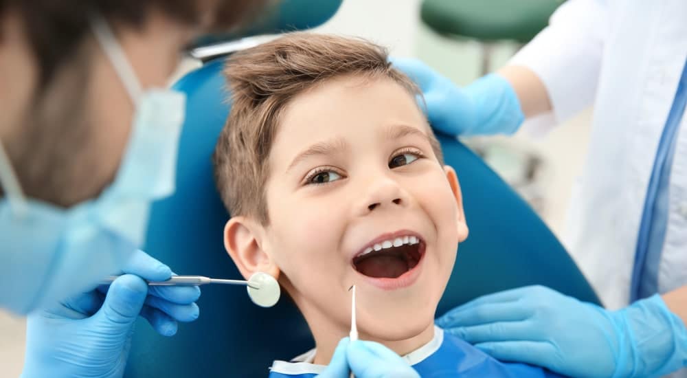 tandverzekering - kind bij de tandarts